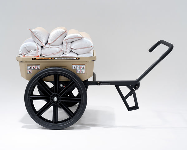 Warrior cart filled with sand bags with the forward handle extending to the side.