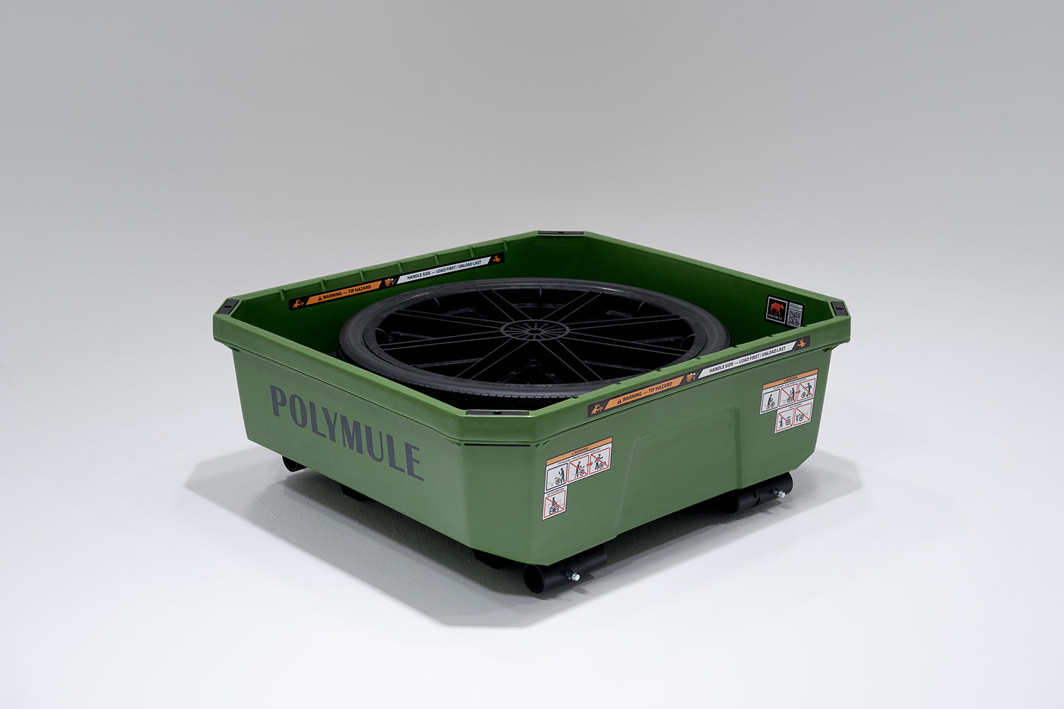 Green WARRIOR Cart. The cart is folded into it's storage position with the handlebar and wheels in the tub.