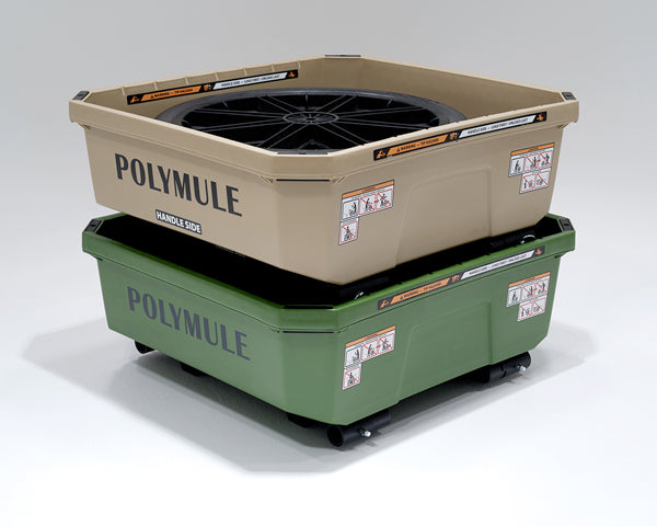 Green and tan Warrior carts stacked with frames folded and handles and wheels stored in their tubs.