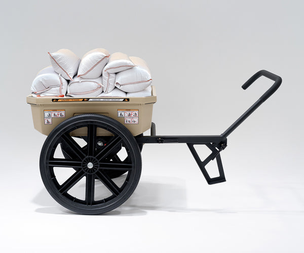Warrior cart filled with sand bags with the forward handle extending to the side.