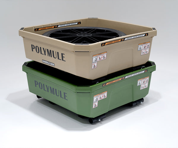 Green and tan Warrior carts stacked with frames folded and handles and wheels stored in their tubs.